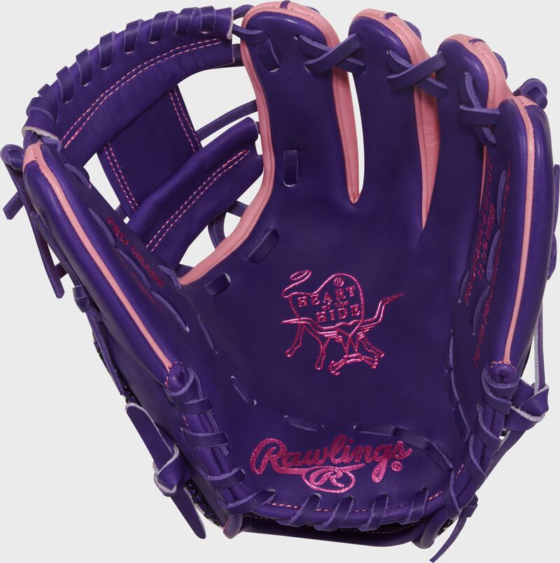 Purple palm of a Rawlings Exclusive Heart of the Hide R2G Purple/Pink 11.5-inch Infield Glove with pink stamping and purple laces