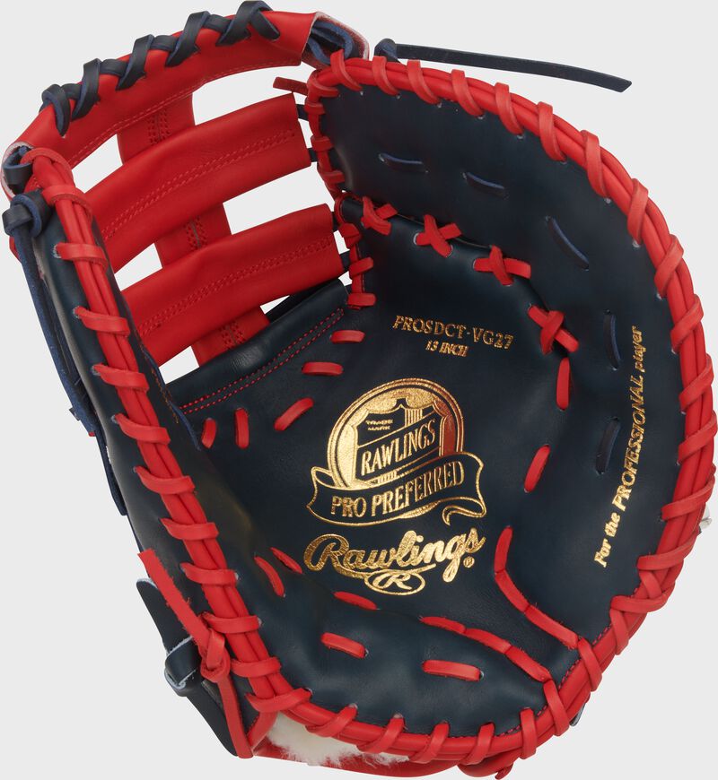 Navy palm of a Rawlings Gameday 57 Series Vladimir Guerrero Pro Preferred 1st base mitt with gold stamping with scarlet laces