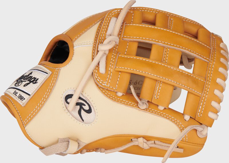 Thumb of a camel/tan Heart of the Hide 11.75" Speed Shell infield glove with a tan H-web