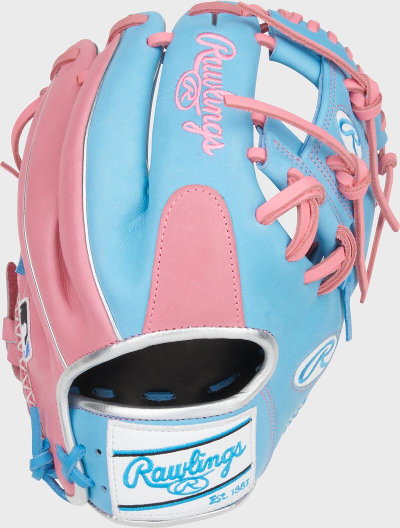 Back of a Columbia blue/pink Heart of the Hide 11.5" infield glove with a pink finger pad and white Rawlings patch