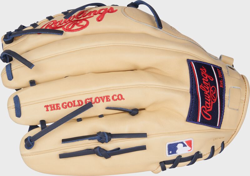 Camel back of a Mike Trout Pro Preferred glove with a navy Rawlings patch and MLB logo on the pinky