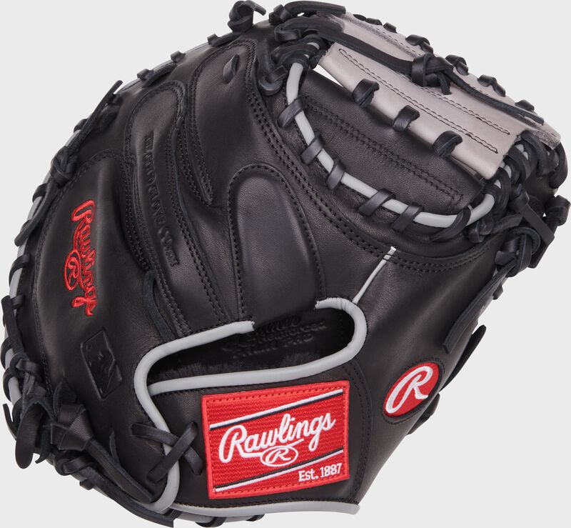 Black back of a Foundation Series 32.5" youth catcher's mitt with a red Rawlings patch - SKU: RSGRFCM325B loading=