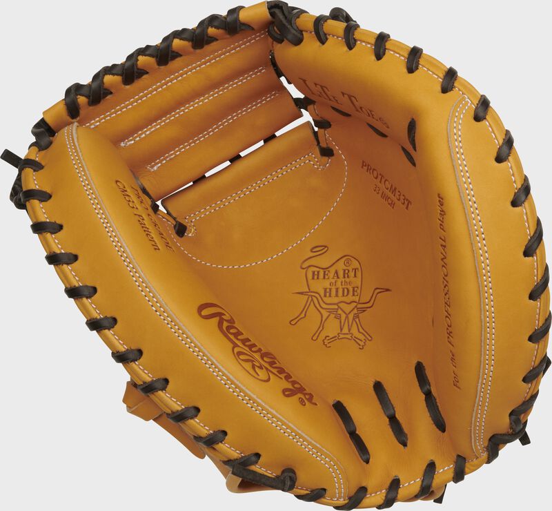 Tan palm of a Rawlings Heart of the Hide catcher's mitt with dark tan laces - SKU: PROTCM33T