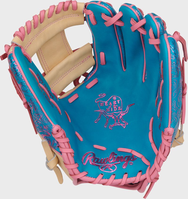 Teal palm of a Heart of the Hide Vibrant Series teal topo print infield glove