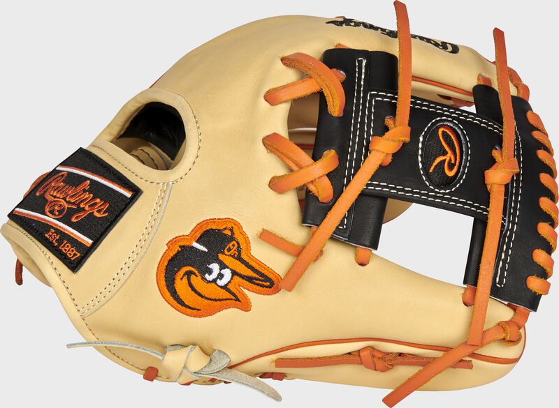 Thumb of a camel 2021 Baltimore Orioles Heart of the Hide glove with the Orioles logo on the thumb - SKU: RSGPRO204-2BAL loading=