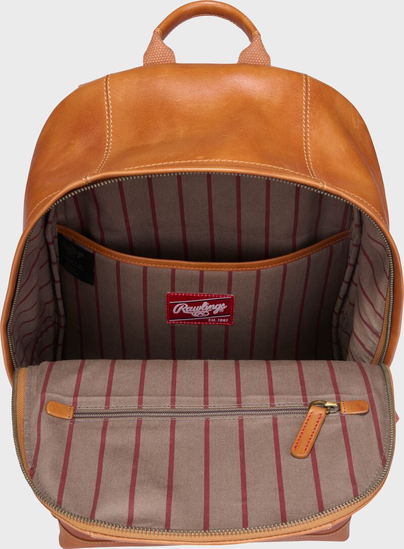 Inside view of a tan Rawlings Double Play mini backpack