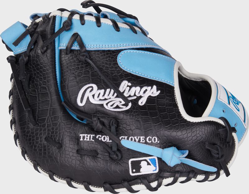 Black back of a Heart of the Hide 12.5" DCT first base mitt with the MLB logo on the pinky