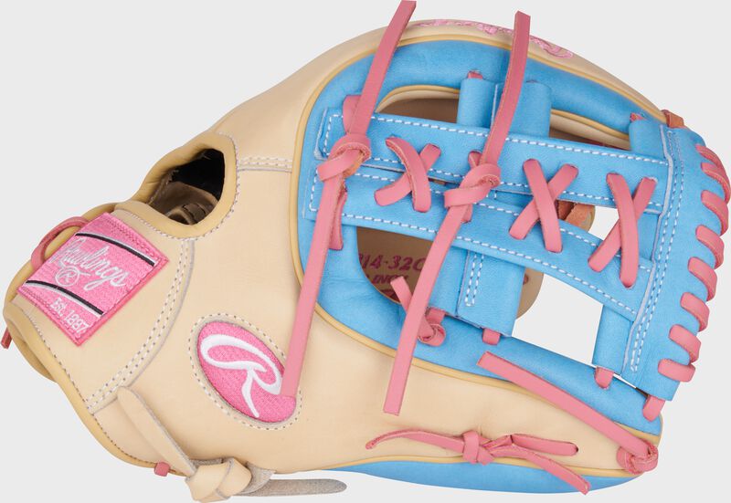 Thumb of a camel Heart of the Hide 11.5" infield baseball glove with a Columbia blue Split, Laced Single Post web