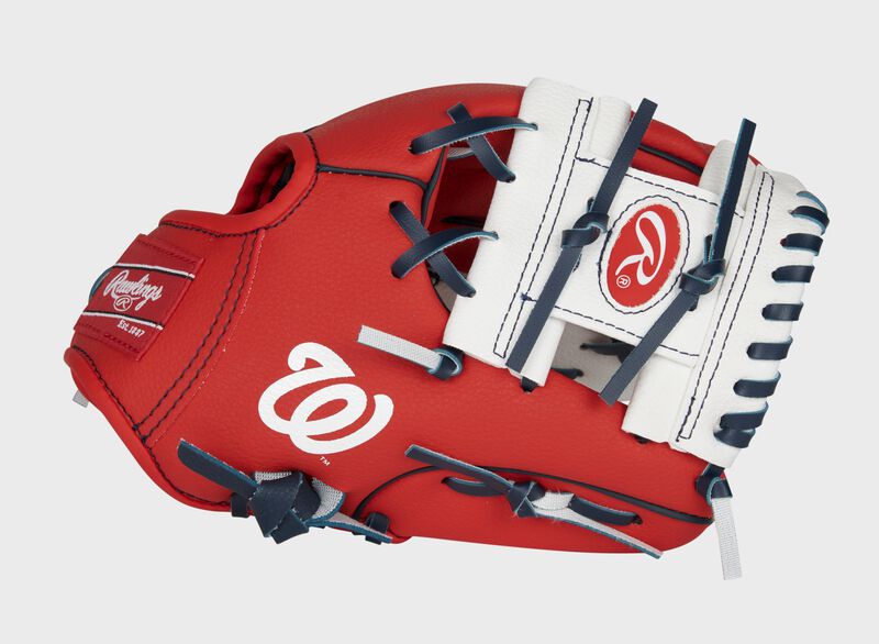 Thumb of a red/white Washington Nationals 10-inch team logo glove with a white I-web and Nationals logo on the thumb - SKU: 22000031111 loading=
