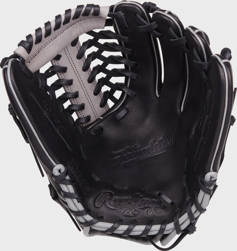 Black palm of a Rawlings Aaron Judge Foundation Series youth glove with black laces - SKU: RSGRF206-4B loading=