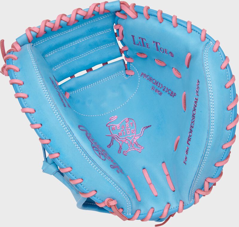 Palm of a Heart of the Hide 33-Inch Catcher's Mitt with pink stamping and pink laces
