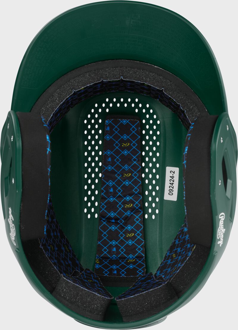 Inside padding of a dark green Rawlings RX2 batting helmet