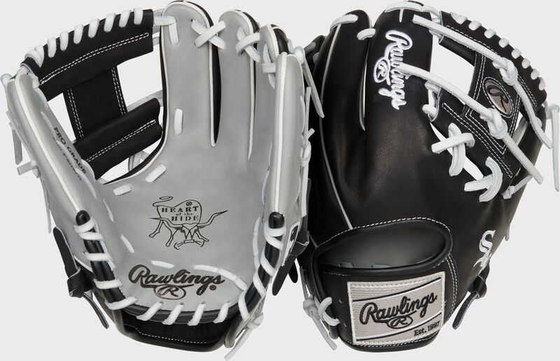 Two images showing the palm & back of a gray/black Chicago White Sox Heart of the Hide glove