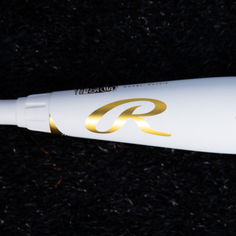 Gold Rawlings "R" logo on a white Rawlings USSSA Icon baseball bat - SKU: RUT4I
