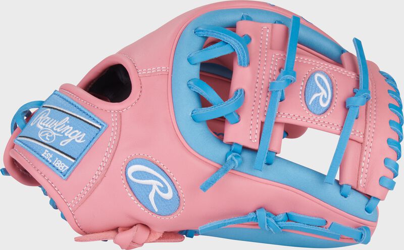 Thumb of a pink/Columbia blue Rawlings NXT Series 11.5-Inch Infield Glove with a pink Pro I-web