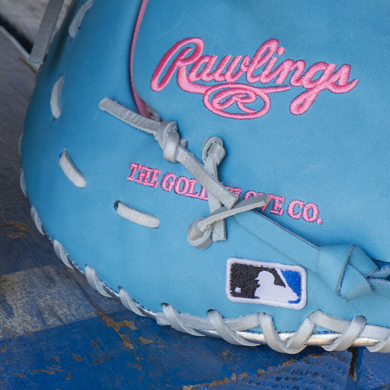 Picture of the MLB logo on the pinky of an Exclusive Heart of the Hide 13-Inch 1st Base Mitt
