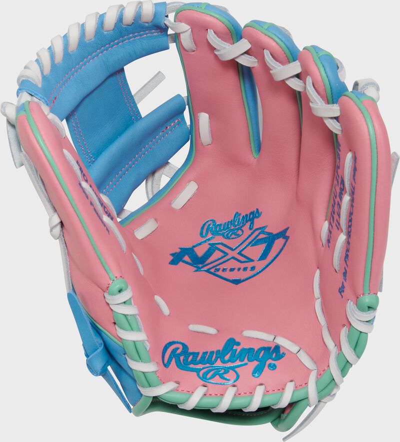 Pink palm of a Rawlings Exclusive Rawlings NXT Series 11.5" Infield Glove with columbia blue stamping and white laces loading=