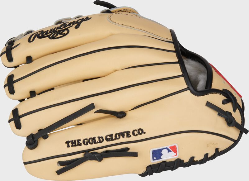 Camel back of a Manny Machado Pro Preferred infield glove with the MLB logo on the pinky  - SKU: PROSNP6-MM13 loading=