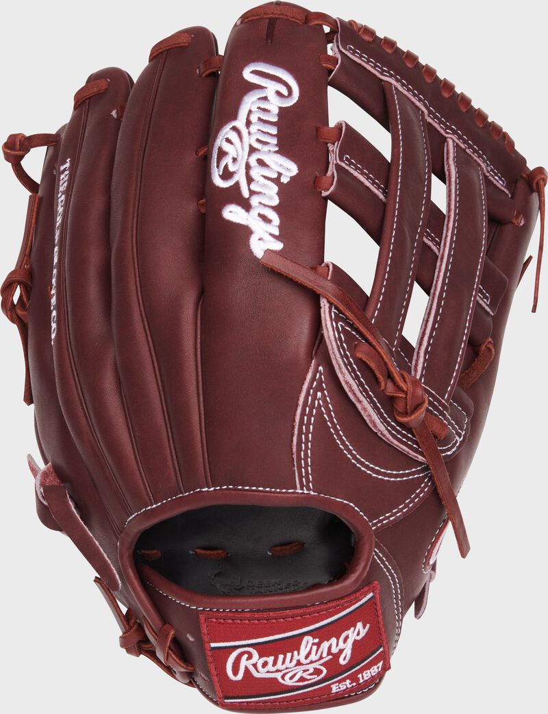 Sherry back of a Heart of the Hide 12.75" H-web glove with a maroon Rawlings patch