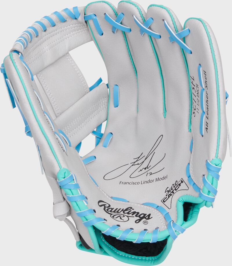 Gray palm of a Sure Catch Francisco Lindor glove with Francisco Lindor's signature stamped on the palm loading=