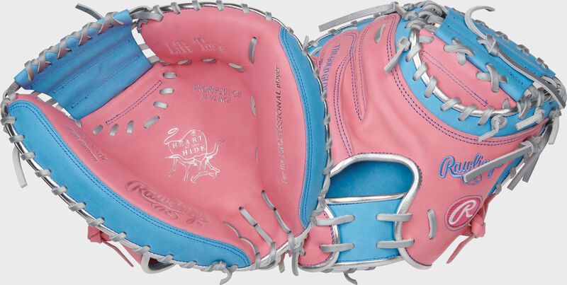 Two images showing the palm & back of a pink/Columbia blue exclusive Heart of the Hide 32.5" catcher's mitt
