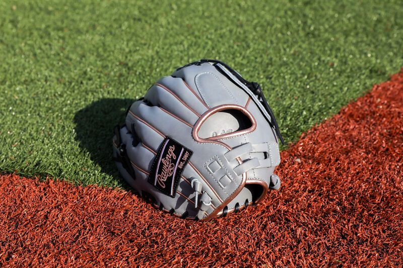 Back of a gray Liberty Advanced Color Series outfield glove on a field - SKU: RLA1275SB-6GRG loading=