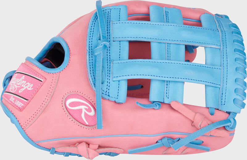 Thumb of a pink/Columbia blue exclusive Heart of the Hide ContoUR Fit outfield glove with a Columbia blue H-web