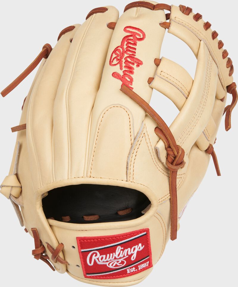Back of a camel Heart of the Hide Trea Turner 11.5" infield glove with a red Rawlings patch - SKU: PRONP4-1TT loading=