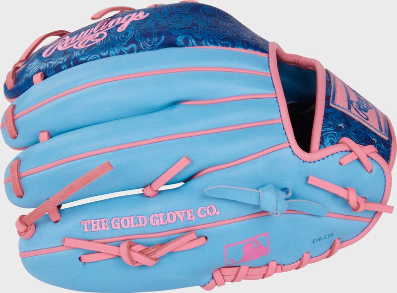 Columbia blue back of a Heart of the Hide Vibrant Series blue topo print 11.5" infield glove with the MLB logo on the pinky