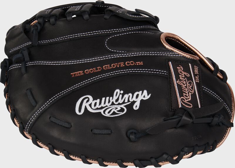 Black back of a Rawlings R9 Series 12.5" 1st base mitt with a black/rose gold Rawlings patch loading=