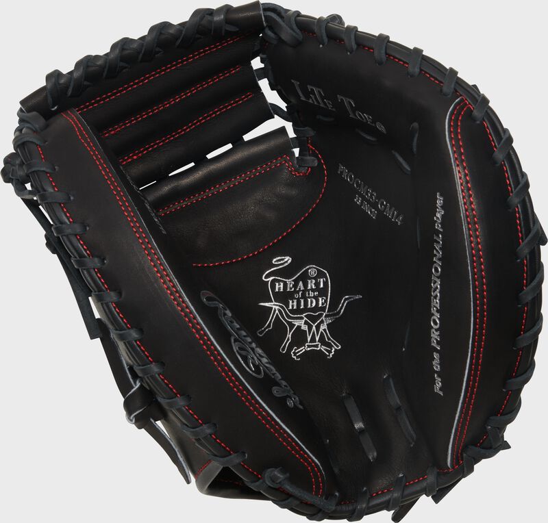 Black palm of a Gameday 57 Series Gabriel Moreno Heart of the Hide Catcher's Mitt with a silver palm stamp and black laces loading=