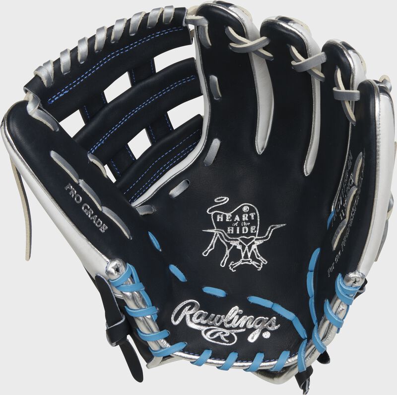 Navy palm of a Rawlings Heart of the Hide fastpitch softball glove with silver stamping and white/Columbia blue laces - SKU: PRO715SB-6N loading=