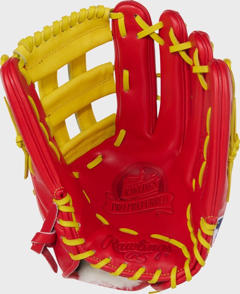 Scarlet palm of of a Rawlings Pro Preferred 12.75" outfield glove with yellow laces