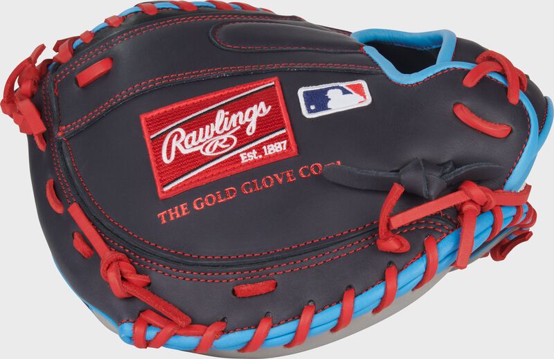Back of a navy Rawlings NXT Series 32.5-Inch Catcher's Mitt with a red Rawlings patch