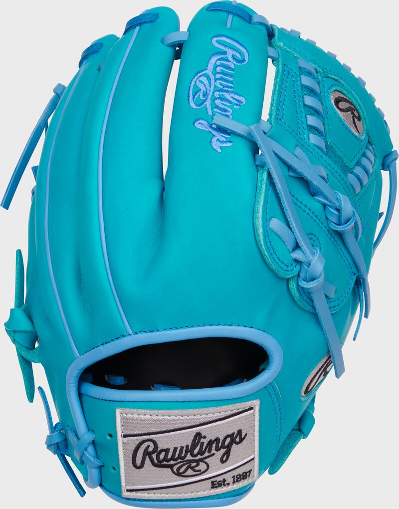 Back of a teal Heart of the Hide 11.75" infield/pitcher's glove with a gray Rawlings patch