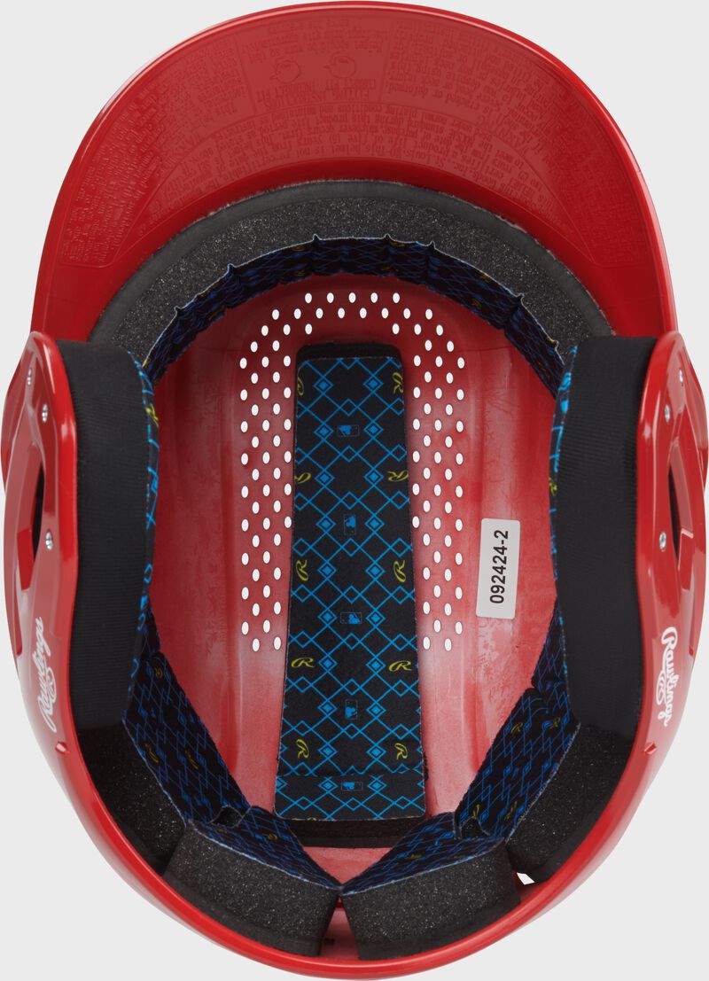Inside padding of a scarlet Rawlings RX2 gloss baseball batting helmet