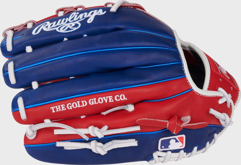 Royal/scarlet back of a Luis Robert Jr. Heart of the Hide Outfield Glove with the MLB logo on the pinky