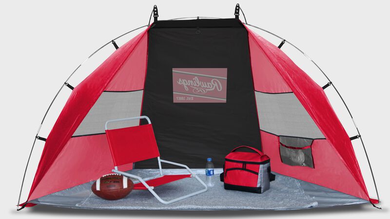 Inside of a red/black Rawlings sun shelter with a chair and cooler inside - SKU:00974043511 loading=