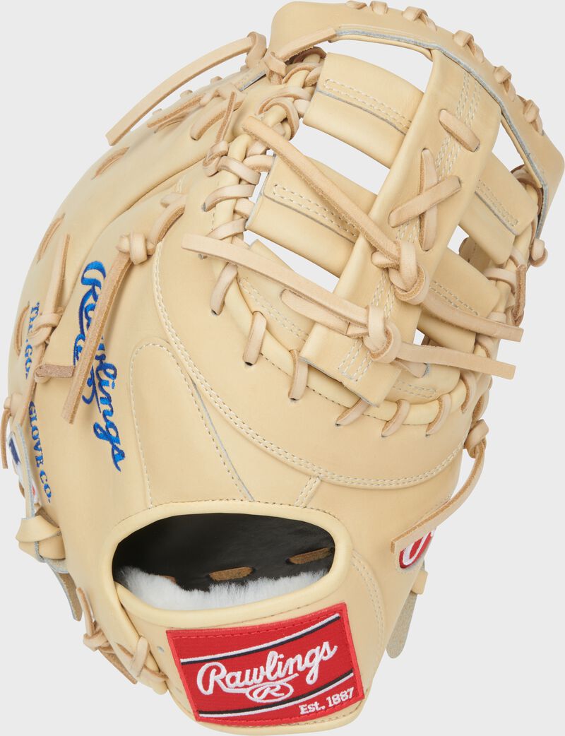 Back of a camel Bryce Harper Pro Preferred 13-Inch 1st Base Mitt with a red Rawlings patch