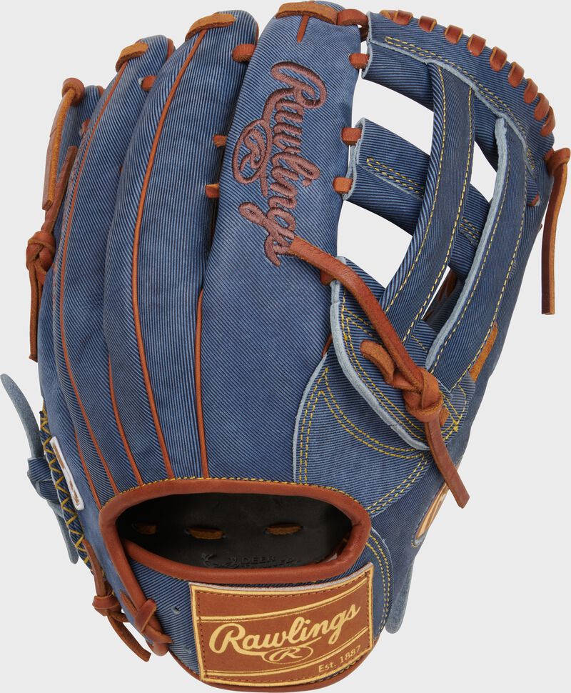 Back of a Heart of the Hide Pro Label Denim outfield glove with a tan leather Rawlings patch