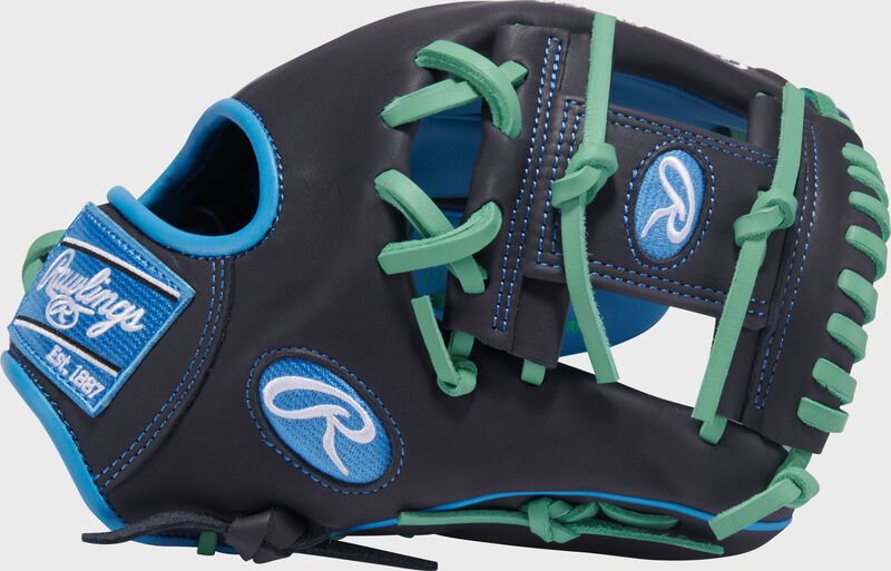 Thumb of an Exclusive Rawlings NXT Series 11.5" Infield Glove with a navy I-web loading=