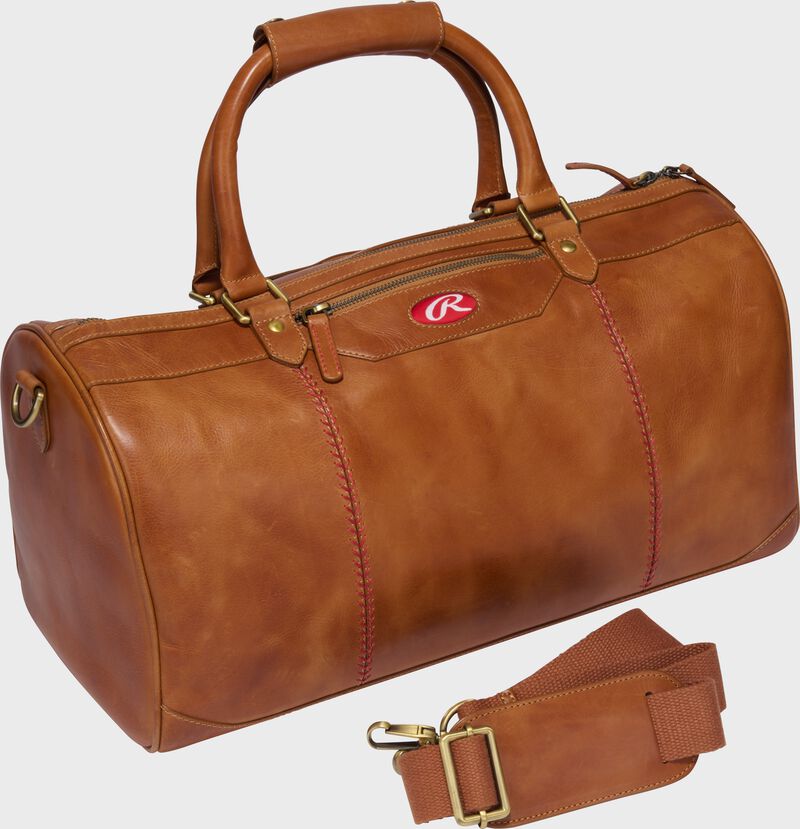 A tan Double Play duffle bag with the shoulder strap