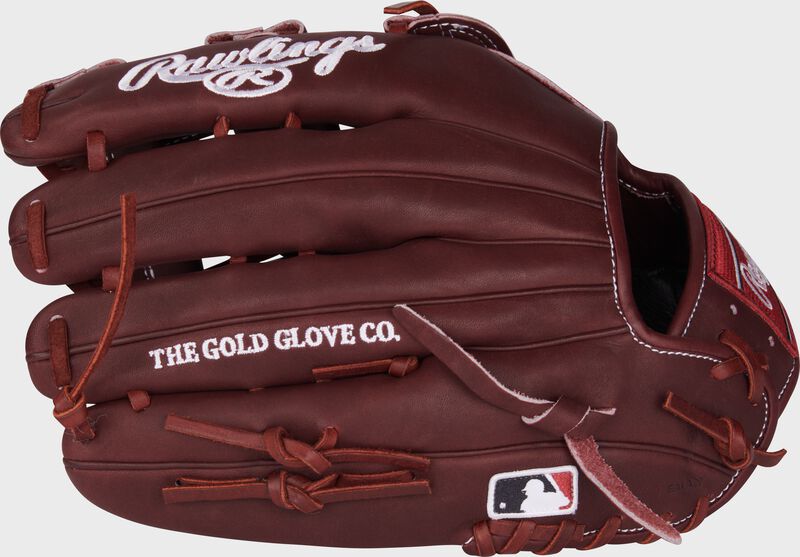 Sherry back of a Heart of the Hide 12.75" outfield glove with the MLB logo on the pinky