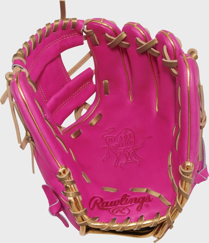 Palm of a berry Rawlings Heart of the Hide berry 11.5" infield glove with gold laces