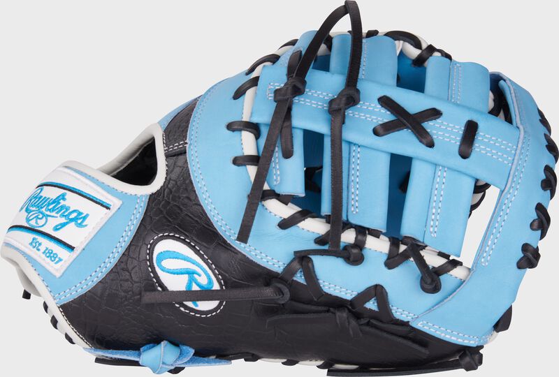 Thumb of a black/Columbia blue Heart of the Hide 12.5" first base mitt with a Columbia blue single post, double bar web