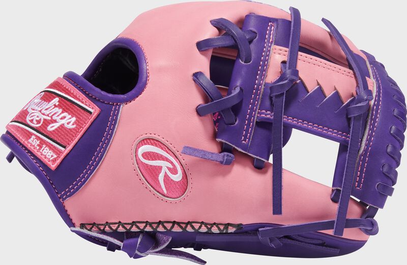 Pink thumb of an Exclusive Heart of the Hide R2G Purple/Pink 11.5-inch Infield Glove with a purple/pink I-web