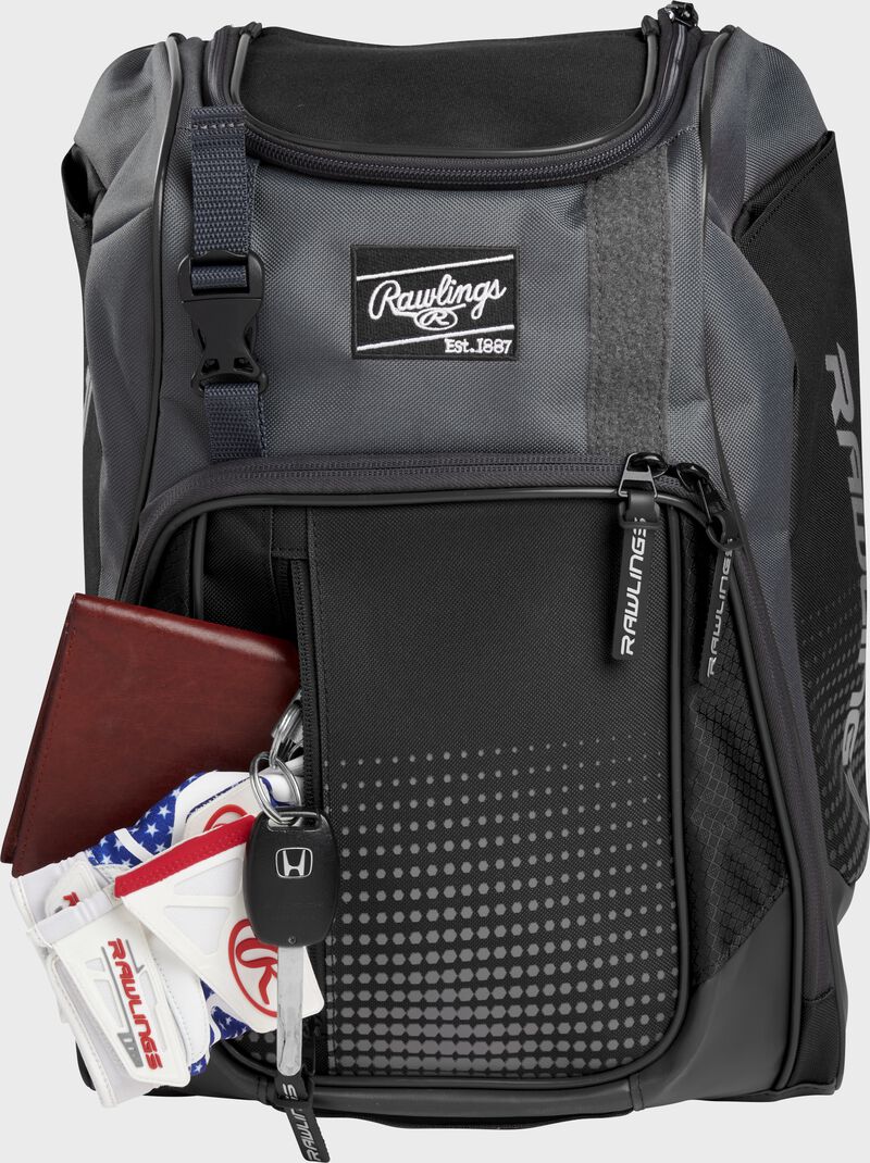 Wallet, keys, and batting gloves in the front valuables pocket of a black Franchise baseball bag - SKU: FRANBP-B