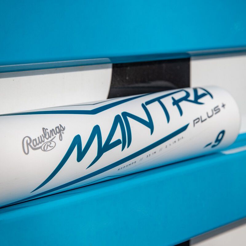 Barrel of a white Mantra+ fastpitch bat on a blue bench - SKU: RFP3MP loading=