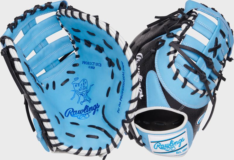 Two images showing the palm & back of a black/Columbia blue Heart of the Hide 12.5" first base mitt