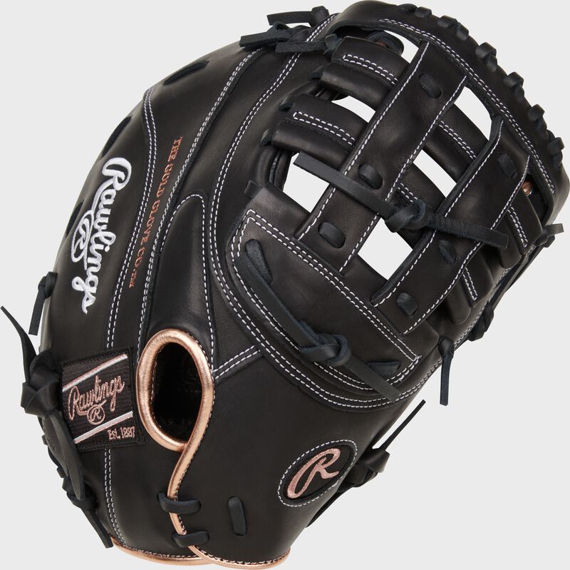 Black back of a Rawlings R9 Series 12.5" fastpitch first base mitt loading=
